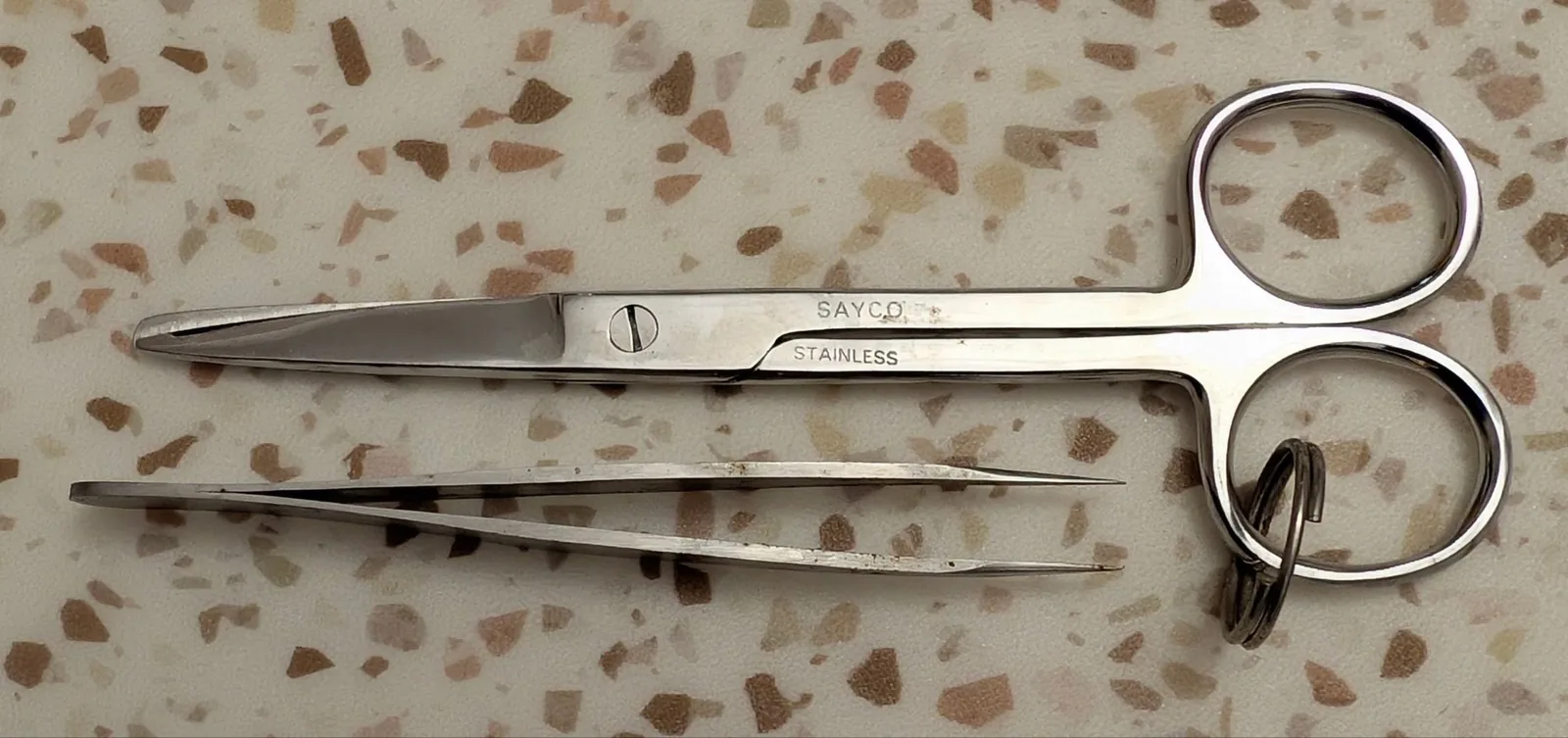 scissors and tweezers for remote area first aid kit