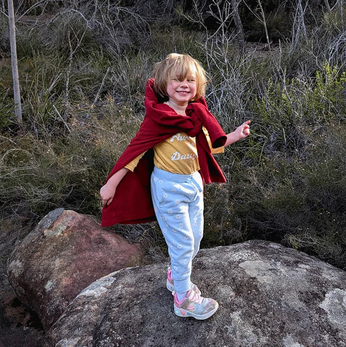Kid dancing on a hike