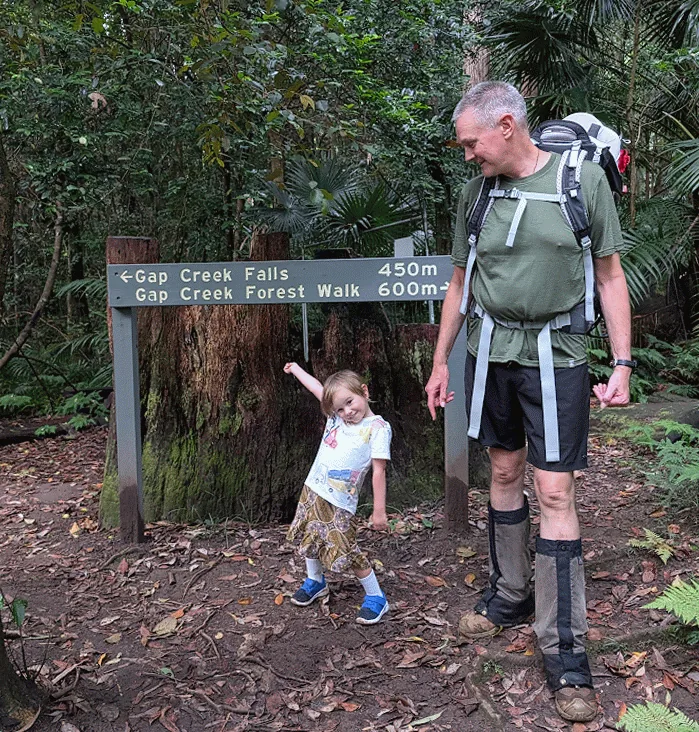 Kid dancing at the end of a hike